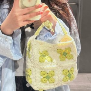 green cherry blossom bag is meticulously crocheted with five strand cotton thread. it serves multiple functions, acting as a daily schoolbag, a single shoulder bag, or a bag for snacks and lunch boxes. each piece is truly one of a kind, making it an ideal choice for both gift giving and personal use. whether for daily commuting or other occasions, it pairs seamlessly with any clothing, adding a unique charm to your appearance. children can use it to store stationery or snacks during trips. moreover, it is soft and resistant to color fading.