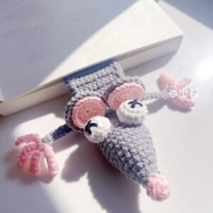 big mouse hand knitted cute bookmark；reading companion & bag charm；each piece is hand knitted with meticulous care, boasting a soft, skin friendly texture and delicate details that reflect thoughtful craftsmanship.slip it between pages, and it becomes your perfect reading buddy—effortlessly marking your progress while adding a playful, whimsical touch to your daily reading moments. add a touch of ritual to your reading with this charming little companion.with its adorable, distinctive design, it makes a thoughtful gift for book lovers, friends, and family, blending practicality with heartfelt warmth.more than just a bookmark, it can also be attached to your bag (with a clasp, if desired) as a cute accessory, adding a fun, whimsical flair to your everyday outfits and outings—one piece, multiple uses!crafted from high quality knitted materials, it’s durable, resistant to deformation and wear, and easy to maintain. it will accompany your reading and adventures for years to come, becoming a cozy little keepsake by your side