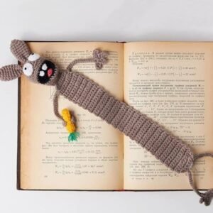 rabbit hand knitted cute bookmark；reading companion & bag charm；each piece is hand knitted with meticulous care, boasting a soft, skin friendly texture and delicate details that reflect thoughtful craftsmanship.slip it between pages, and it becomes your perfect reading buddy—effortlessly marking your progress while adding a playful, whimsical touch to your daily reading moments. add a touch of ritual to your reading with this charming little companion.with its adorable, distinctive design, it makes a thoughtful gift for book lovers, friends, and family, blending practicality with heartfelt warmth.more than just a bookmark, it can also be attached to your bag (with a clasp, if desired) as a cute accessory, adding a fun, whimsical flair to your everyday outfits and outings—one piece, multiple uses!crafted from high quality knitted materials, it’s durable, resistant to deformation and wear, and easy to maintain. it will accompany your reading and adventures for years to come, becoming a cozy little keepsake by your side.