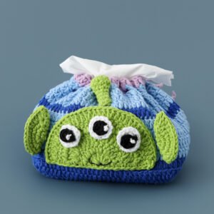 hand knitted toy story alien tissue cover, soft cotton yarn, unique playful charm, safe & practical decor, meaningful nostalgic keepsake.