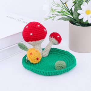 hand knitted mushroom phone stand, soft cotton yarn, unique whimsical charm, safe & functional decor, meaningful nature inspired keepsake