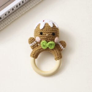 hand crochet gingerbread man teething rattle, soft cotton yarn with wooden ring, safe festive sensory toy for babies, meaningful holiday newborn keepsake