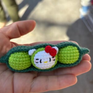 hand knitted pea pod keychain, soft cotton yarn, unique cute charm, safe & cozy decor, meaningful hello kitty keepsake