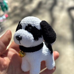hand knitted black & white puppy keychain, soft cotton yarn, unique cute charm, safe & cozy decor, meaningful loyal keepsake.