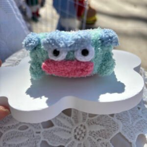 hand knitted clownfish cake roll keychain, soft cotton yarn, unique cute charm, safe & cozy decor, meaningful sweet keepsake