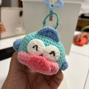 hand knitted big head hangyodon keychain, soft cotton yarn, unique quirky charm, safe & cozy decor, meaningful sanrio keepsake