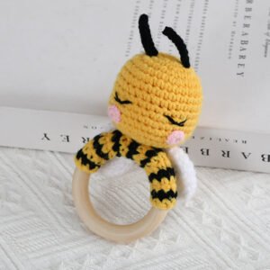 hand crochet black yellow striped bee teething rattle, soft cotton yarn with wooden ring, safe sensory toy for babies, meaningful newborn keepsake